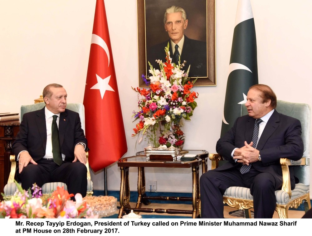 President Erdou011fan talking with Pakistani Prime Minister Muhammad Nawaz Sharif during their meeting at Pakistani Prime Minister House on Feb 28.
