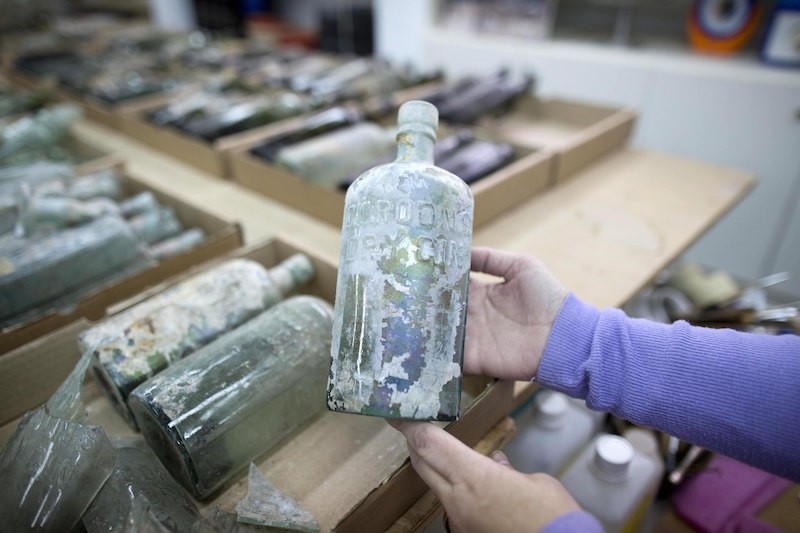 Archaeologists of the Israel Antiquities Authority found hundreds of liquor and soda glass bottles at an excavation site at a building where British soldiers were garrisoned during the First World War near the city of Ramla. (EPA Photo)
