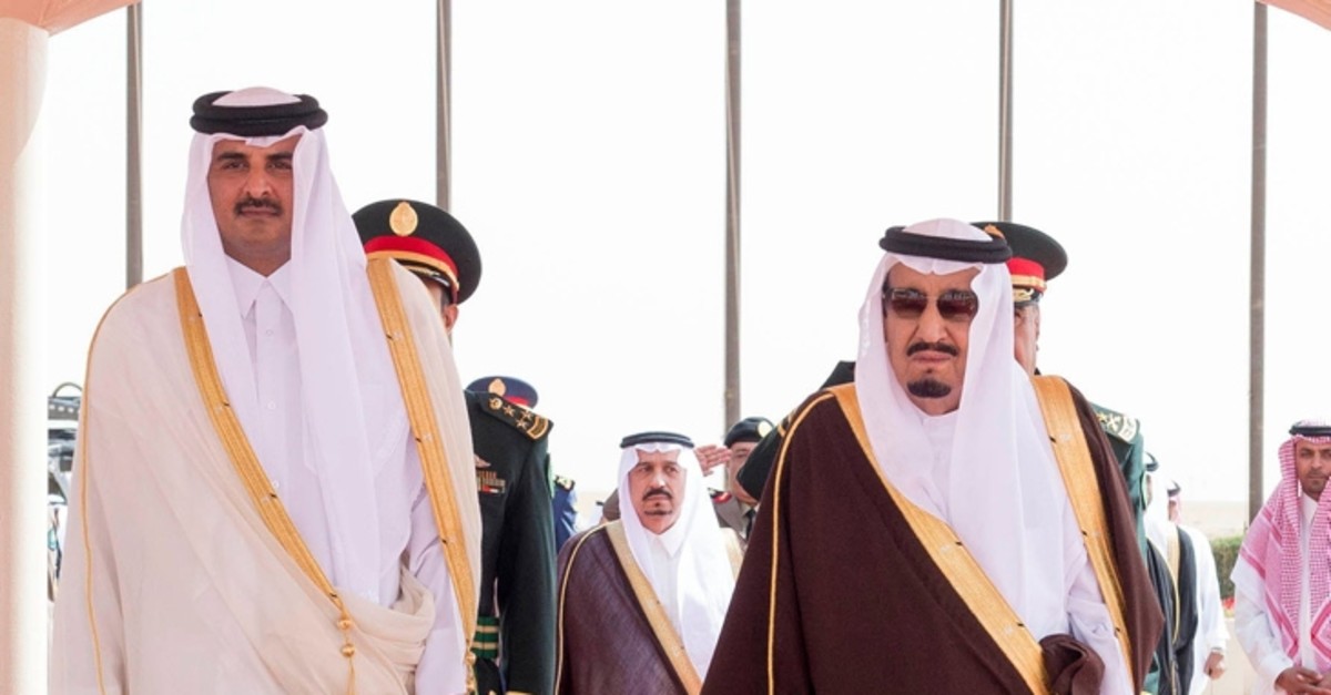 King Salman bin Abdulaziz receives Crown Prince Sheikh Tamim Bin Hamad Al Thani (L) of Qatar in Riyadh, in this February 17, 2015 handout picture. (Reuters Photo)