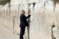 U.S. President Donald Trump touches the Western Wall, Judaism's holiest prayer site, in Jerusalem's Old City. Many protests against Trump's decision to move his country's embassy to Jerusalem were portrayed as anti-Semitic.