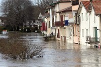 A view of flooded houses, in Peyrorade, southwestern France, caused by heavy rains. Southwestern France is on alert for violent storms, high winds and floods, Dec. 14, 2019 (AP Photo)
