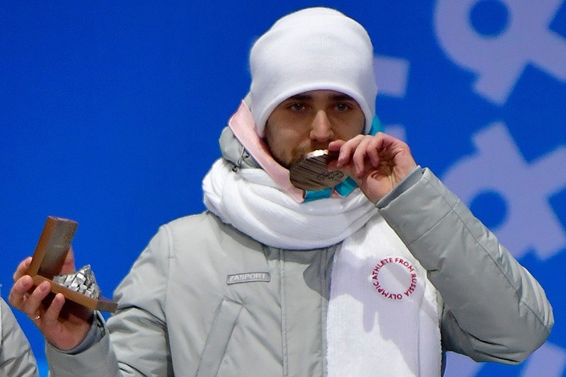  In this file photo taken on Feb. 14, 2018, Russia's bronze medallist Aleksandr Krushelnitckii poses on the podium during the medal ceremony for the curling mixed doubles at the Pyeongchang Medals Plaza (AFP Photo)