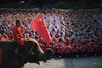 An elephant joins Thai students as they form a heart shape on Valentine's Day to show their support for China in the fight against coronavirus in Ayutthaya, outside Bangkok, Thailand, Feb. 14, 2020. (Reuters)