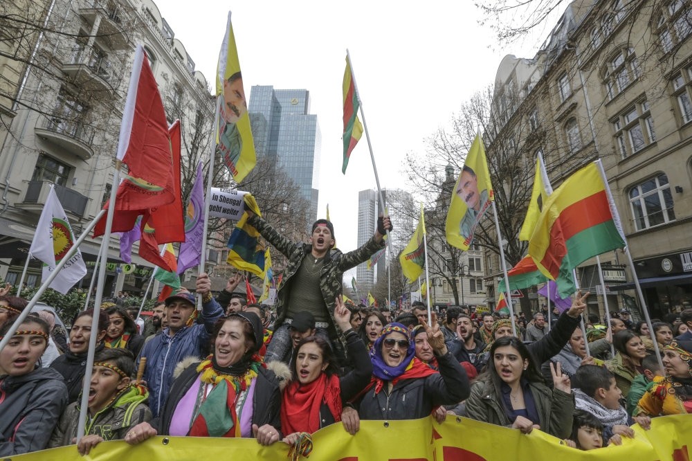 PKK sympathizers hold posters of Abdullah u00d6calan, the head of the outlawed PKK terrorist organization, during an event in Frankfurt, Germany, March 18.