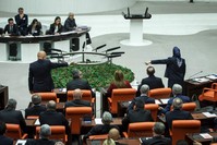 AK Party Deputy Chair u00d6zlem Zengin (front-right) reacts during a session in Parliament, Nov. 20, 2019. (AA Photo)