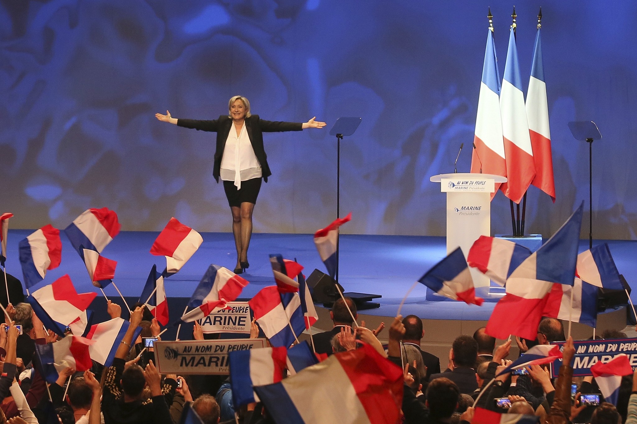 French far-right leader presidential candidate Marine Le Pen gestures at the start of a meeting in Nantes, western France. (AP Photo)