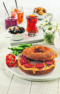 Simit, the Turkish sesame bagel, is one of the food options that one must try when in Turkey, along with a typical Turkish breakfast.