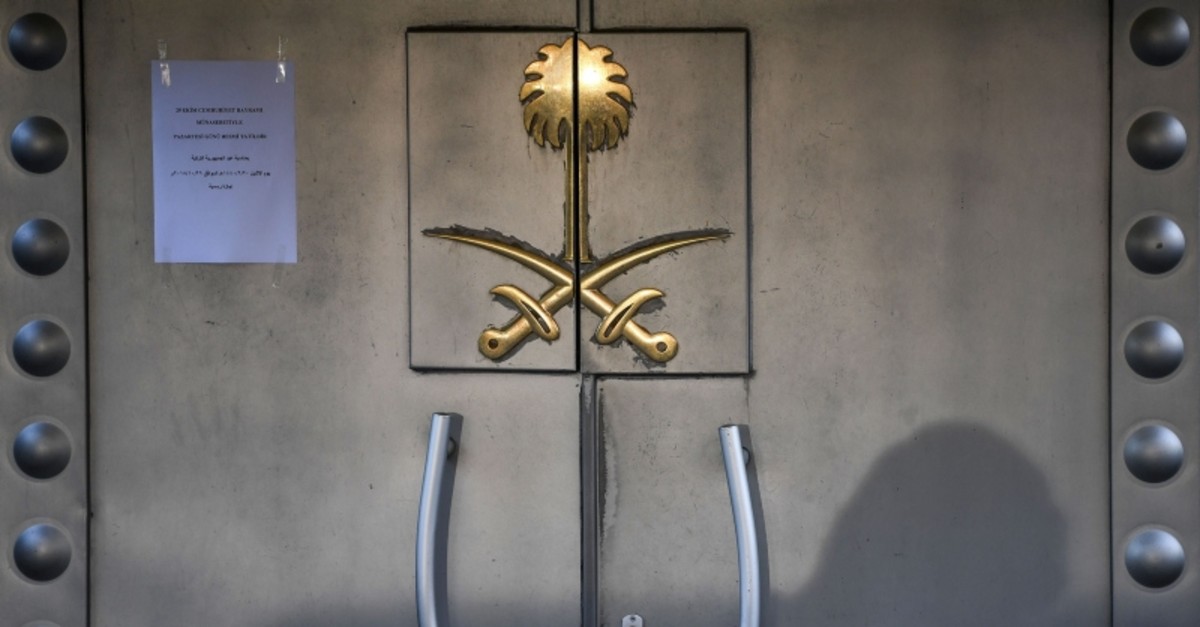 The shadow of a security member of the consulate is seen on the door of the Saudi Arabian Consulate on Oct. 29, 2018, in Istanbul (AFP File Photo)