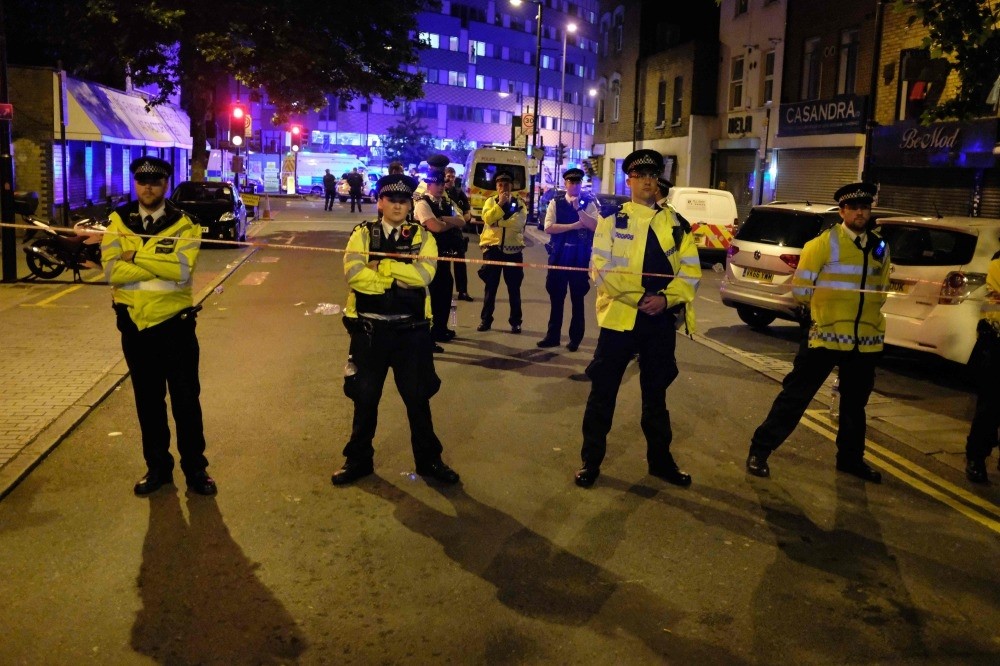 Police cordone off a street in the Finsbury Park area of north London after an attacker drove his van into a group of worshipers at the Muslim Welfare House on Seven Sisters Road, June 19.  