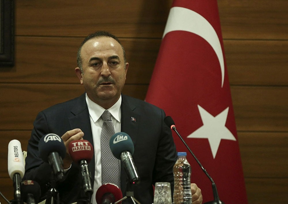 Foreign Minister Mevlu00fct u00c7avuu015fou011flu speaks at the Atatu00fcrk International Airport ahead of his trip to New York in Istanbul, Turkey, Dec. 20, 2017. (AA Photo)
