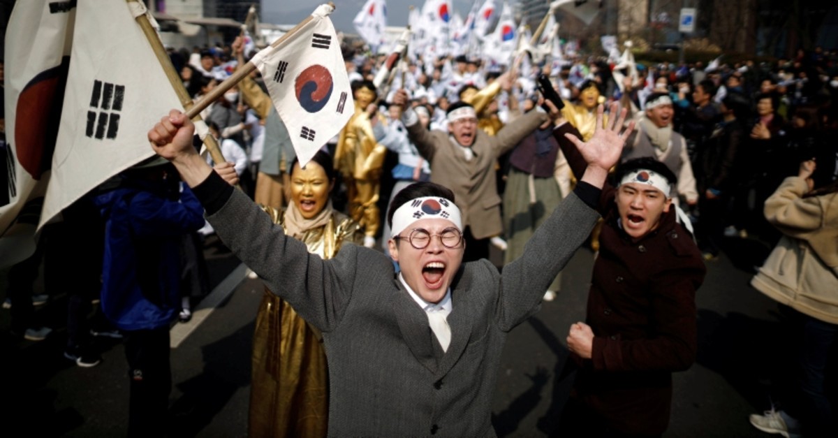 Performers take part in a re-enactment of the historic March First Independence Movement against Japanese colonial rule, in central Seoul, South Korea, March 1, 2019. (REUTERS Photo)