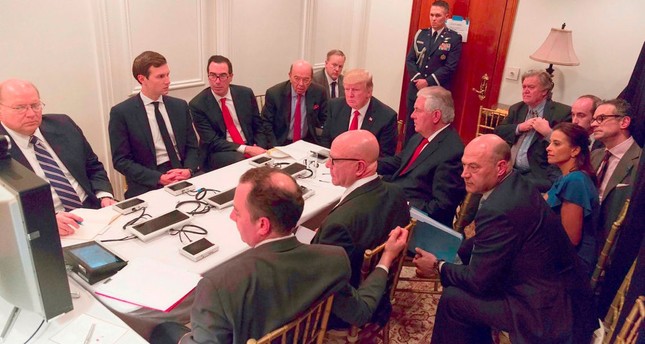 U.S. President Donald Trump receiving a briefing with his closest advisors on the Syria military strike from the National Security team via secure video teleconference on April. (AP Photo)