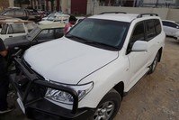 Pakistani journalists examine a car of American diplomate parked inside a police station after an accident in Islamabad, Pakistan, Saturday, April 7, 2018. (AP Photo)