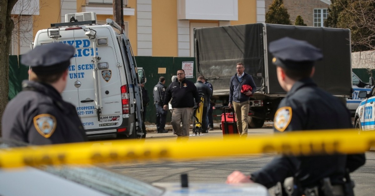 NYC Police officers (NYPD) investigate the scene where, reported New York Mafia Gambino family crime boss, Francesco ,Franky Boy, Cali, was killed outside his home in the Staten Island borough of New York City, U.S., March 14, 2019. (Reuters Photo)