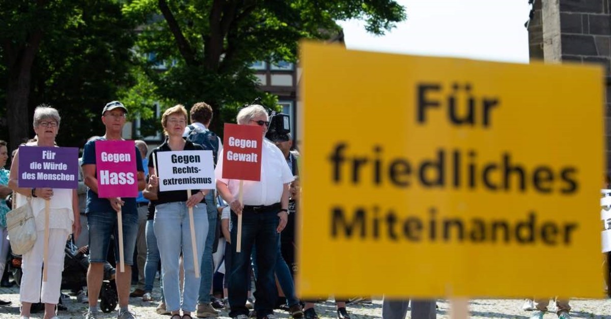 People take part in a vigil against right-wing extremism, Wolfhagen, June 22, 2019.