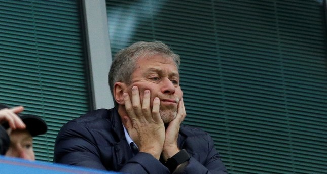Chelsea soccer club owner Roman Abramovich sits in his box before the English Premier League soccer match between Chelsea and Sunderland at Stamford Bridge stadium in London. (AP Photo)