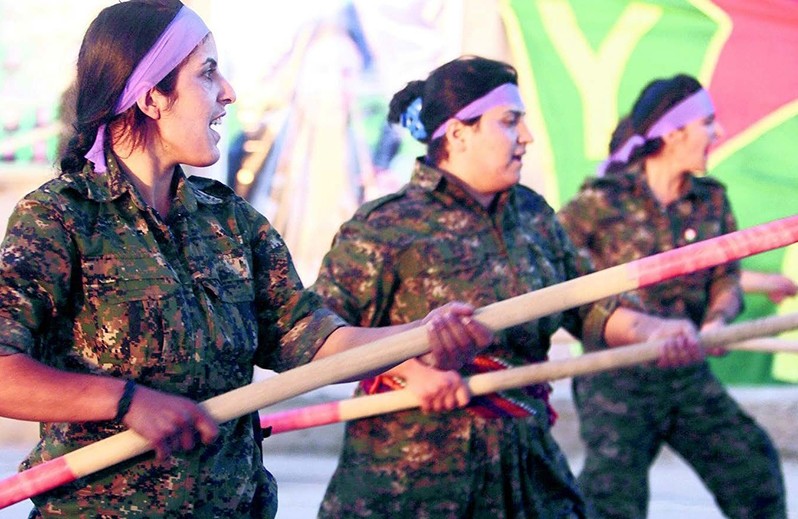 Silhan Özçelik (seen in the middle) was sentenced to 21 months of prison over ties to terrorist PKK.
