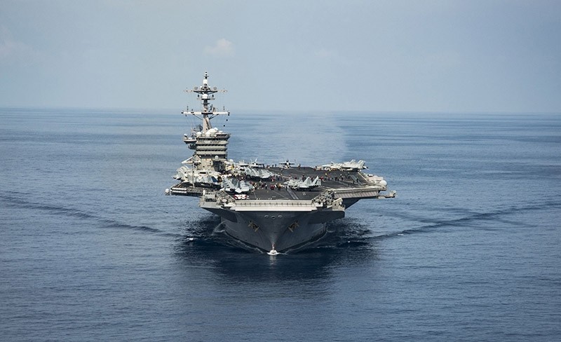 This image obtained from the US Navy shows the aircraft carrier USS Carl Vinson on the South China Sea while conducting flight operations on April 9, 2017. (AFP Photo)
