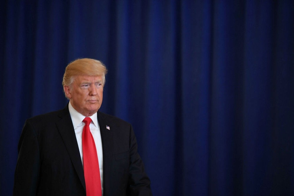 The U.S. President Donald Trump speaks to the press about protests in Charlottesville at Trump National Golf Club in Bedminster, New Jersey on Aug. 12.
