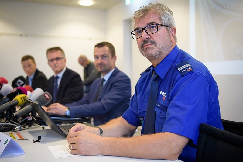 Stephan Ramseyer, senior youth attorney, spokesman Hanspeter Kruesi, Stefan Kuehne, head of the criminal investigation, and Deputy commander Sigi Ruegg, from left, attend a press conference of cantonal police St. Gallen, on Oct. 23, 2017 (AP Photo)