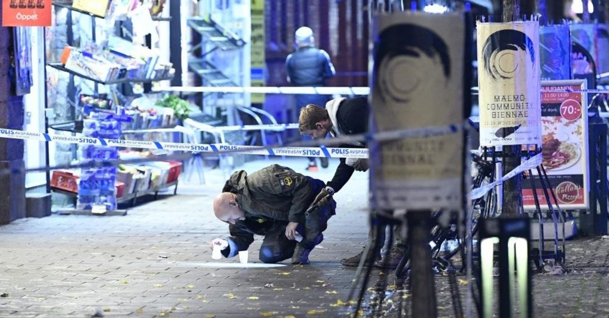 A policeman works near the scene of a shooting, Malmo, Nov. 9, 2019. (AP Photo)