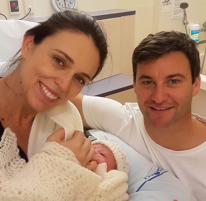 Handout photo made available by Office of the Prime Minister of New Zealand shows New Zealand's Prime Minister Jacinda Ardern (L) and her partner Clarke Gayford (R) posing together with their newborn baby at the Auckland City Hospital. (EPA Photo)