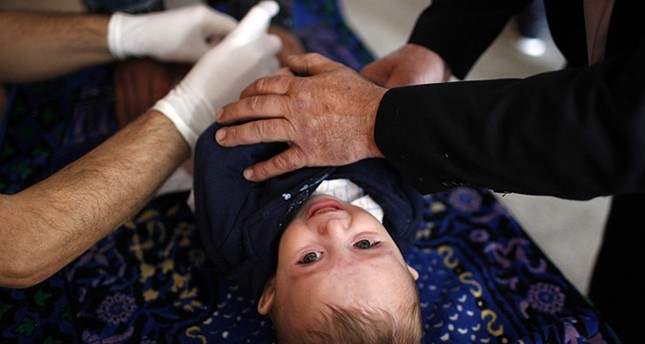 A child is being circumcised (File photo / Reuters)