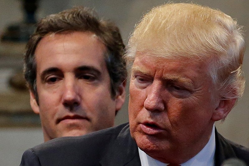 Donald Trump's personal attorney Michael Cohen stands behind him during a campaign stop at the New Spirit Revival Center church in Cleveland Heights, Ohio, U.S. Sept. 21, 2016. (Reuters Photo)