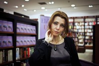 Elif u015eafak, a Turkish novelist of 11 acclaimed books, is being criticized by experts for her hostile attitude toward her country as an attempt to gain popularity.