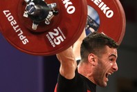 Huru015fit Atak of Turkey makes an attempt during the Men's Final 62 kilogram competition of  the Weightlifting European Championships 2017 in Split, Croatia.