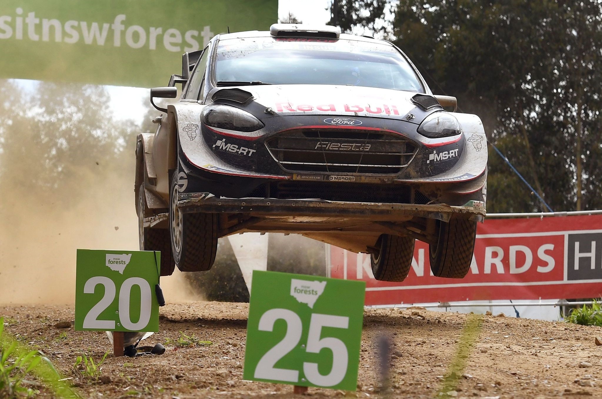 Sebastien Ogier of France speeds over a brow on the final day of the World Rally Championship.