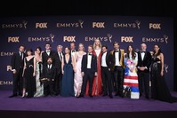 The cast of ,Game of Thrones,, winners of the award for outstanding drama series, pose in the press room at the 71st Primetime Emmy Awards. (AP Photo)