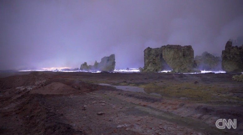 This image captured by CNN shows buring sulfur deposits (yellow rock formations in the picture) in the Al-Mishraq area.