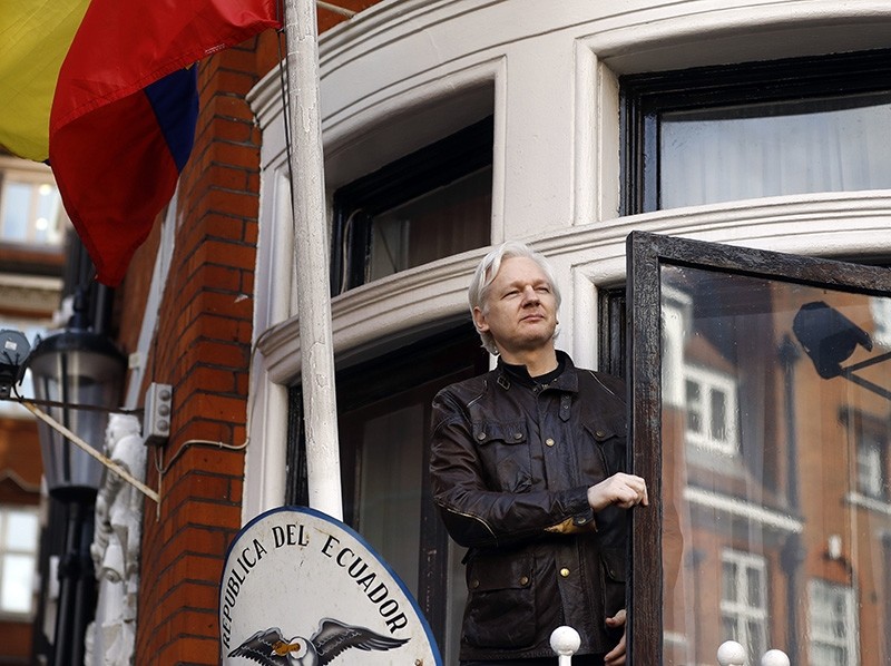 In this Friday May 19, 2017 file photo, WikiLeaks founder Julian Assange greets supporters outside the Ecuadorian embassy in London. (AP Photo)