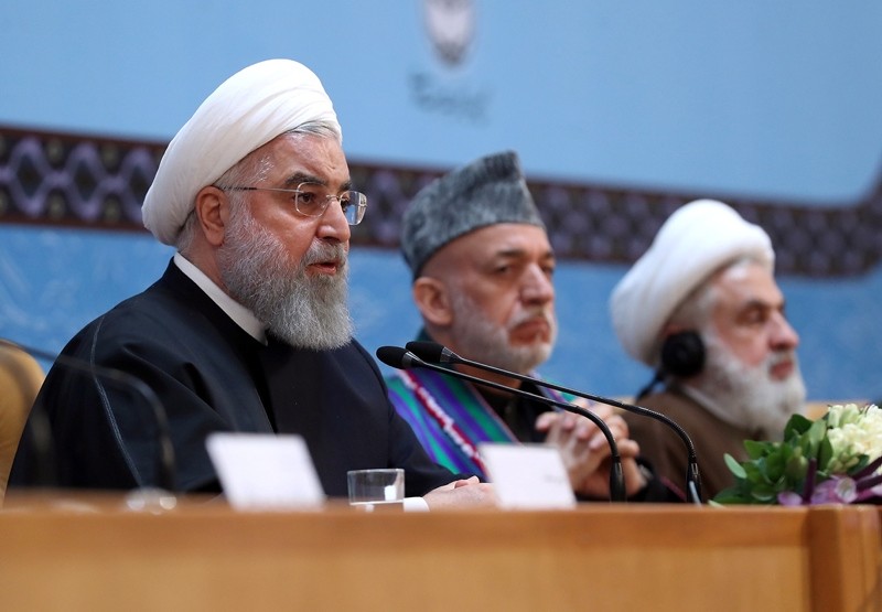 Iranian President Hassan Rouhani (L) speaking during the 32th International Islamic Unity Conference in Tehran, Iran, 24 November 2018. (EPA Photo)