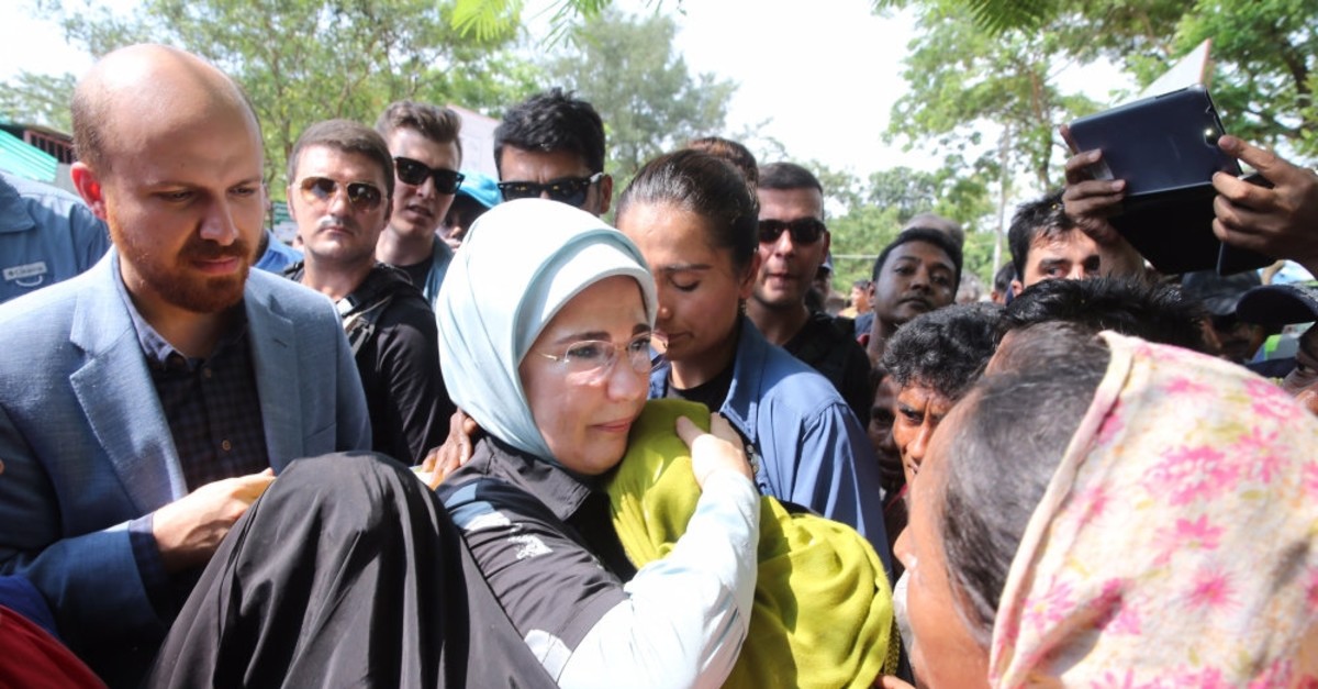Emine Erdou011fan hugs a refugee woman during a visit to a refugee camp for Rohingya Muslims in Cox's Bazaar, Bangladesh in 2017. The first lady was hailed for leading humanitarian efforts for the displaced community.