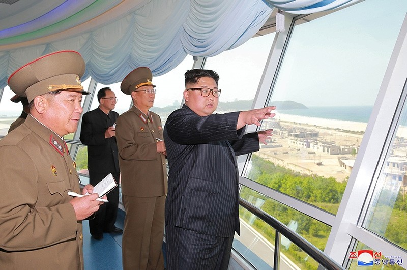 North Korean leader Kim Jong Un inspects the construction site of the Wonsan-Kalma coastal tourist area as Kim Su-gil (3rd L), newly appointed director of the General Political Bureau of the Korean People's Army, looks on. (KCNA via Reuters)