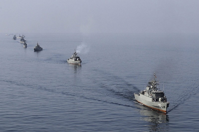 Iranian naval ships take part in a naval parade on the last day of the Velayat-90 war game in the Sea of Oman near the Strait of Hormuz in southern Iran. (File Photo)