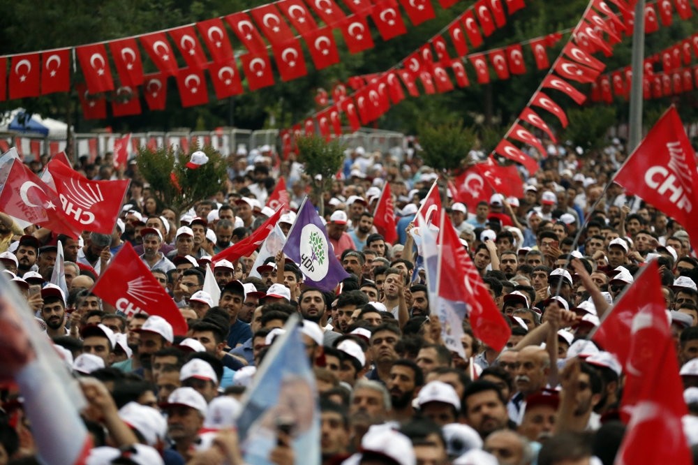 HDP and CHP flags wave side by side during a rally of CHP's presidential candidate Muharrem u0130nce in the southeastern province of Diyarbaku0131r, June 13, 2018.