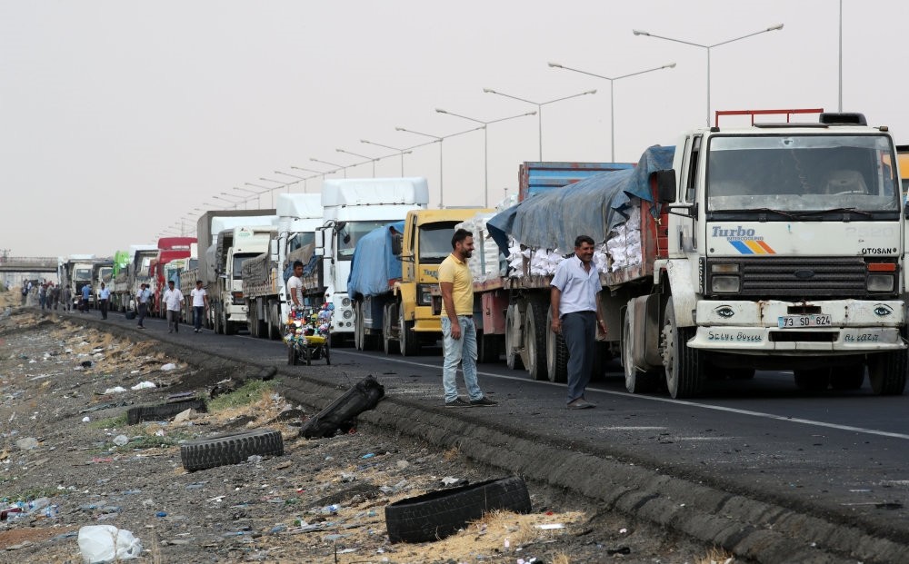 Trucks wait in line to pass Habur border gate near the town of Silopi at the Turkish-Iraqi border.