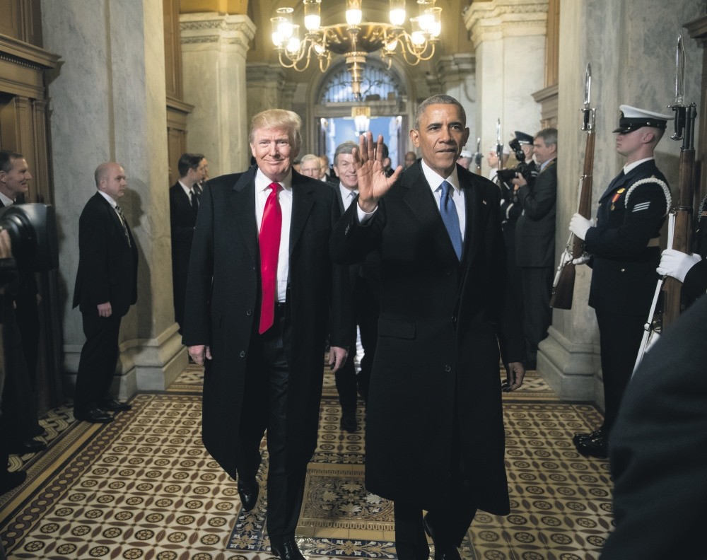 Then-President-elect Donald Trump and then-President Barack Obama arrive for Trump's inauguration ceremony at the Capitol, Washington, Jan. 20, 2017.