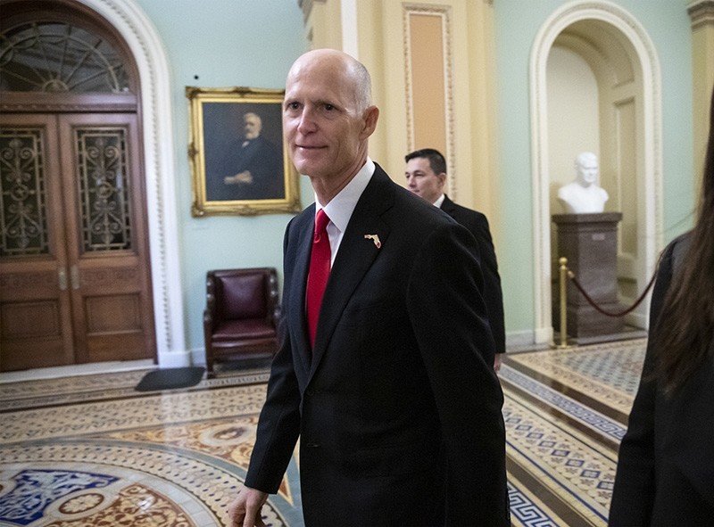 In this Wednesday, Nov. 14, 2018, file photo Florida Gov. Rick Scott arrives for a meeting with Majority Leader Mitch McConnell, R-Ky., and new GOP senators at the Capitol in Washington. (AP Photo)