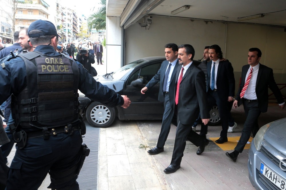 Greek police officers escort eight Turkish putschist officers out of a courthouse in Athens in March. They were the first group of suspects, wanted by Turkey for links to the 2016 coup attempt, to take shelter in Greece. 