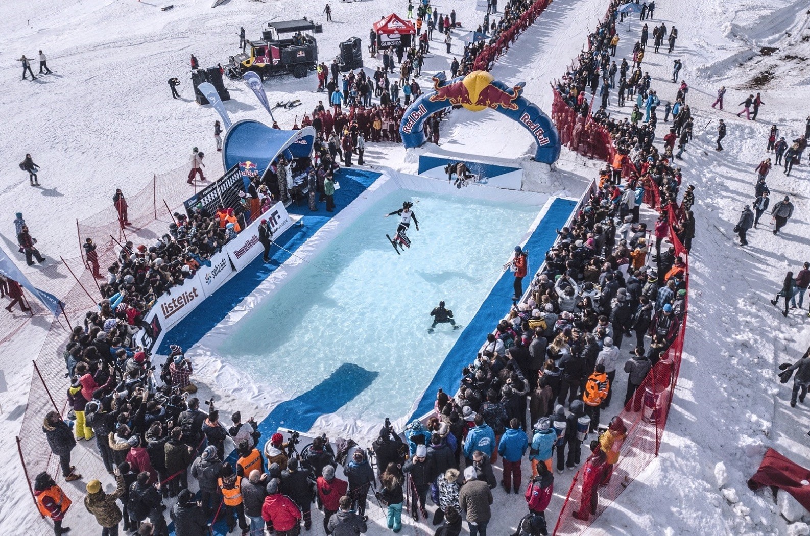 The participants of Red Bull Jump & Freeze will slide down the 50-meter slope into freezing water.