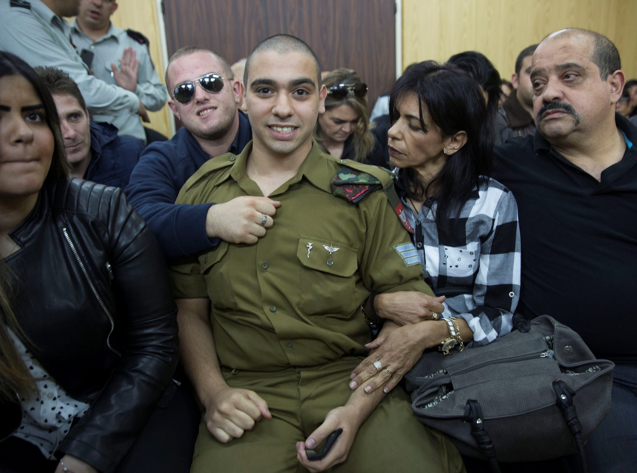Israeli soldier Elor Azaria, who is charged with manslaughter by the Israeli military, sits to hear his verdict in a military court in Tel Aviv, Israel, January 4, 2017. (REUTERS Photo)