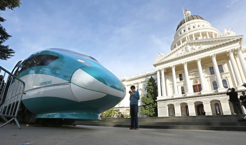  In this Feb. 26, 2015, file photo, a full-scale mock-up of a high-speed train is displayed at the Capitol in Sacramento, Calif. (AP Photo)