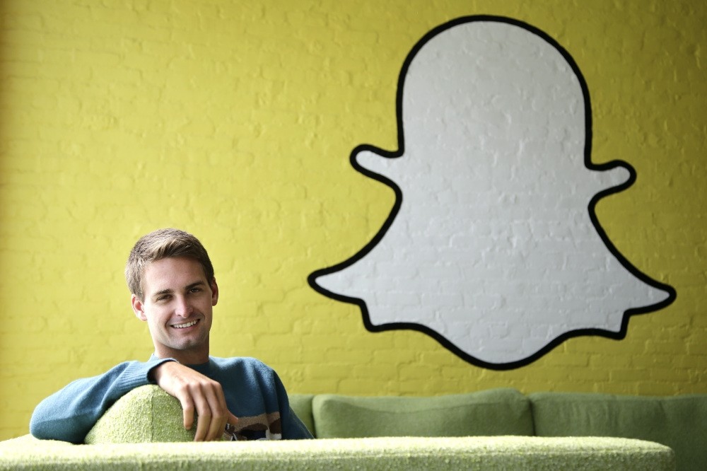 Snapchat CEO Evan Spiegel poses for a photo in Los Angeles. Owner of the ephemeral message service Snapchat, seeks to raise up to $3 billion in an initial public offering.