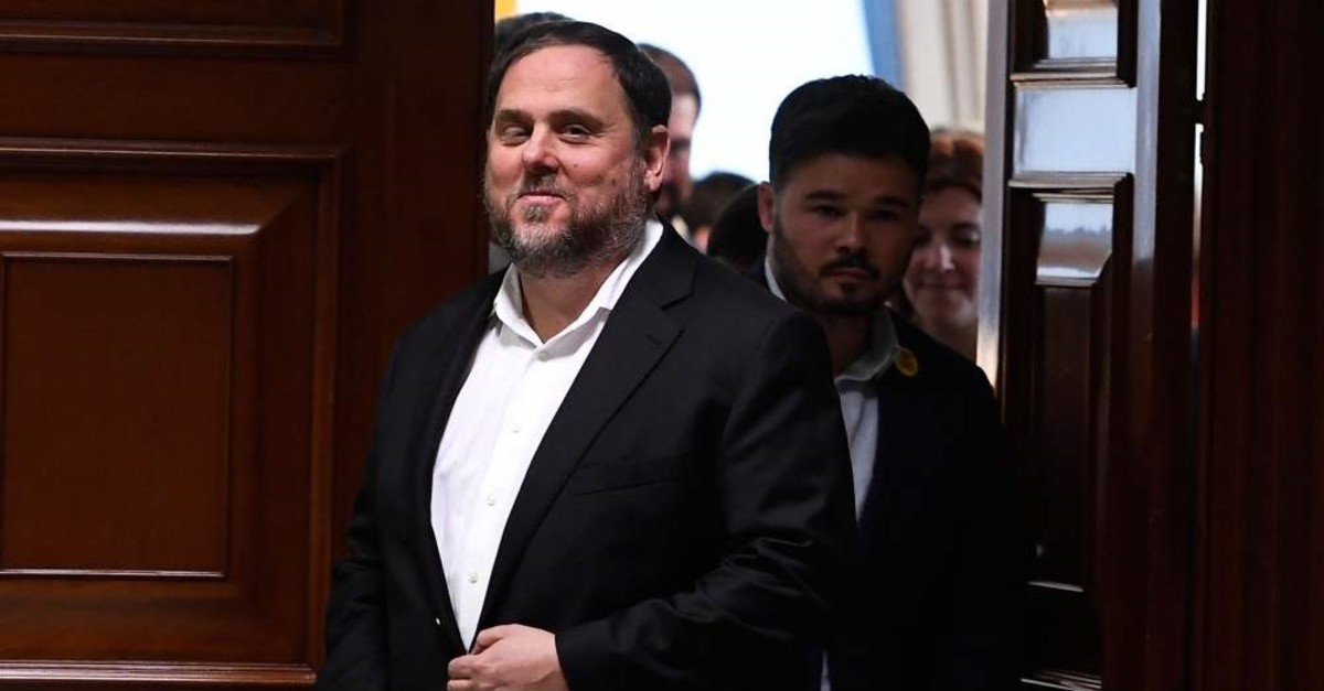 This May 20, 2019 file photo shows Catalonia's former vice-president and elected member of parliament Oriol Junqueras smiling inside the Parliament building in Madrid, after being temporarily released from prison to register as a lawmaker. (AFP Photo)