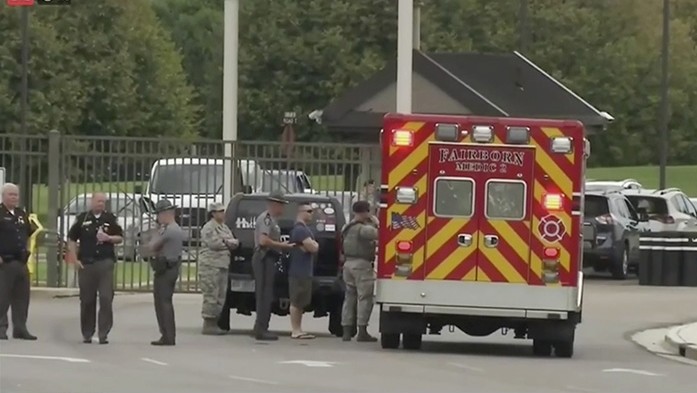 In this frame from video from WKEF, authorities work at the Wright-Patterson Air Force base in Ohio amid reports of an active shooter at the base Thursday, Aug. 2, 2018. (WKEF via AP)