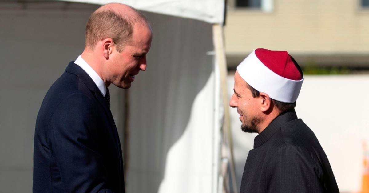 Imam Gamal Fouda (R) receives Britain's Prince William as he arrives to visit Al Noor mosque in Christchurch on April 26, 2019. (Photo by Joseph Johnson / POOL / AFP)